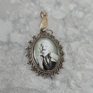 Elegant Silver Brooch with Classic Portrait